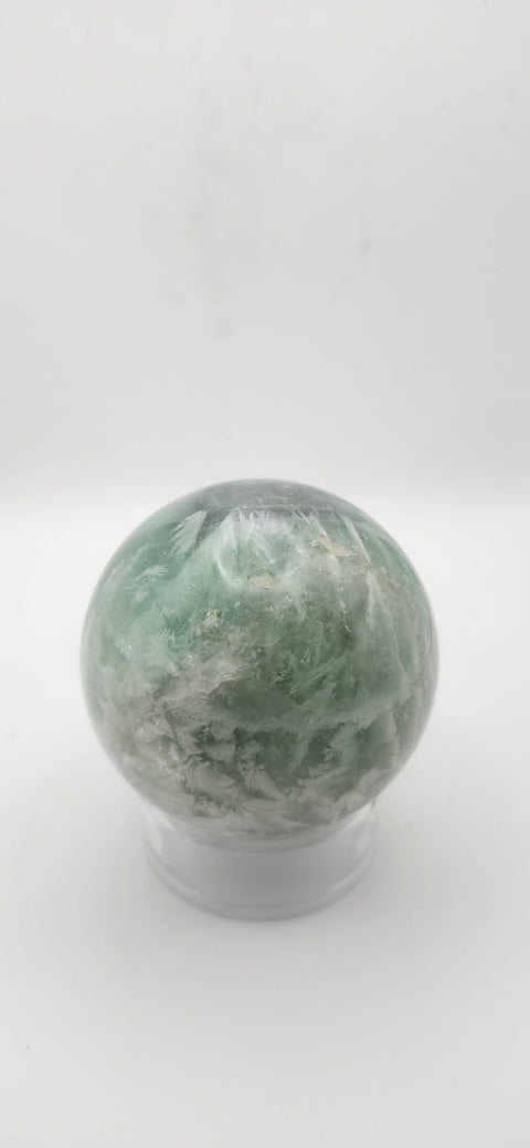 Snowflake florite sphere. 59.6mm, 2.34 inches, 12.4 ounces