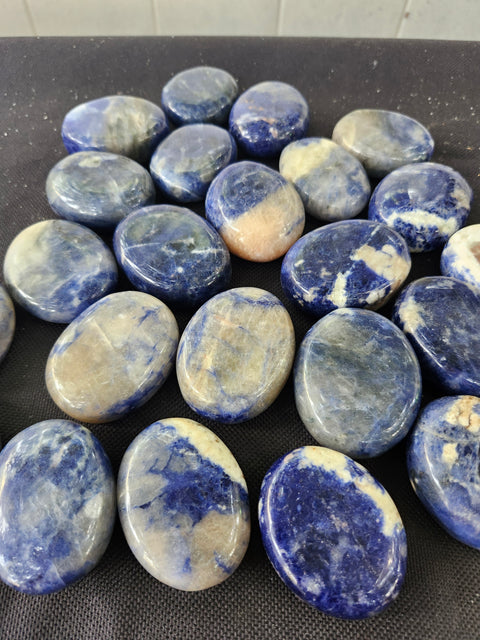 1.5 ounce, 1.75 inch sodalite palm stone uv reactive
