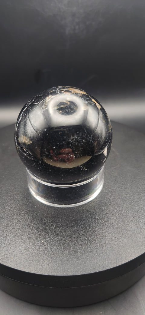 Black tourmaline sphere. 49.6mm, 1.95 inches, 7 ounces