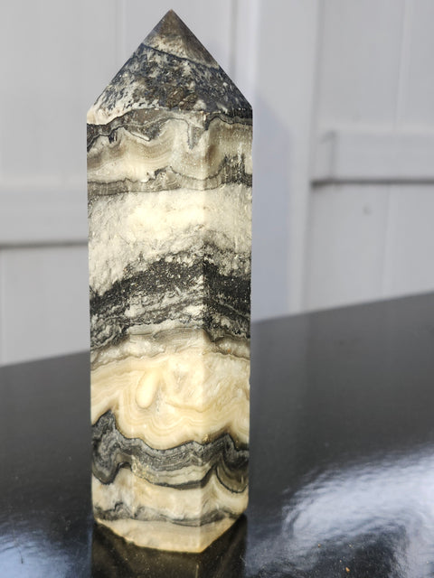Striped calcite tower! 5.1 inches tall, 10 ounces