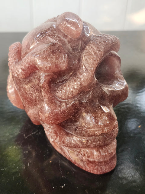 Strawberry quartz skull & snake! 1.6 pounds, 3.9 inches long, 3.3 tall, 2.7 wide
