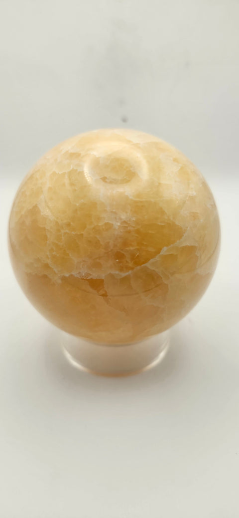 Orange calcite sphere. 72mm, 2.83 inches, 1.3 pounds!