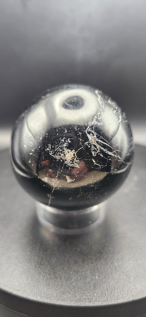 Black tourmaline sphere. 49.8mm, 1.96 inches, 7 ounces