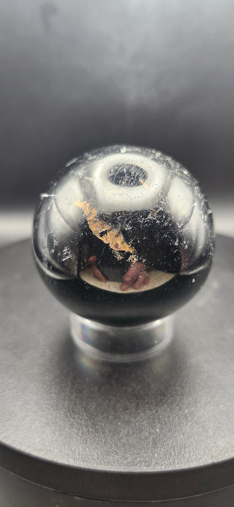 Black tourmaline sphere. 49.8mm, 1.96 inches, 7 ounces