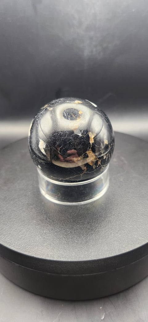 Black tourmaline sphere. 49.6mm, 1.95 inches, 7 ounces