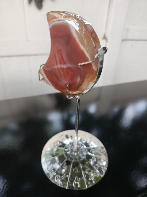 5.4 ounce carnelian moon with zodiac stand