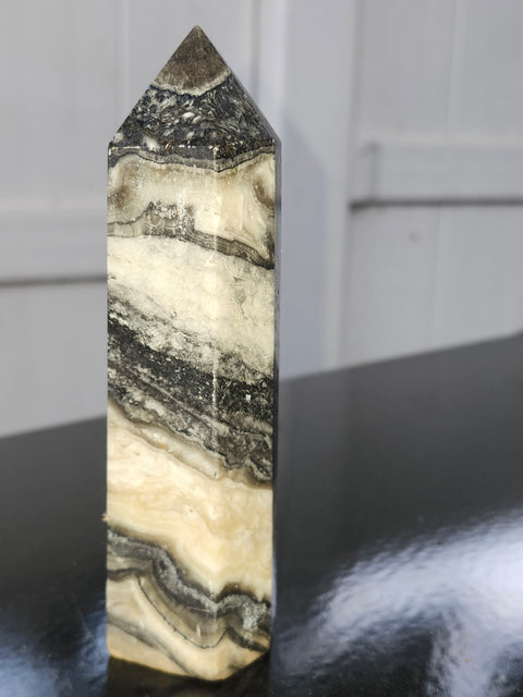 Striped calcite tower! 5.1 inches tall, 10 ounces