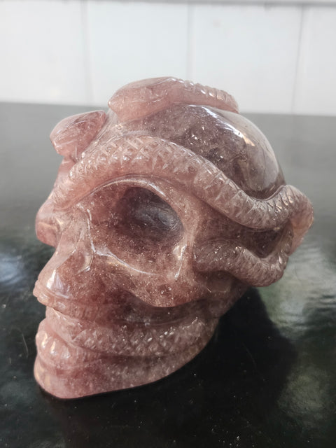 Strawberry quartz skull & snake! 1.6 pounds, 3.9 inches long, 3.3 tall, 2.7 wide
