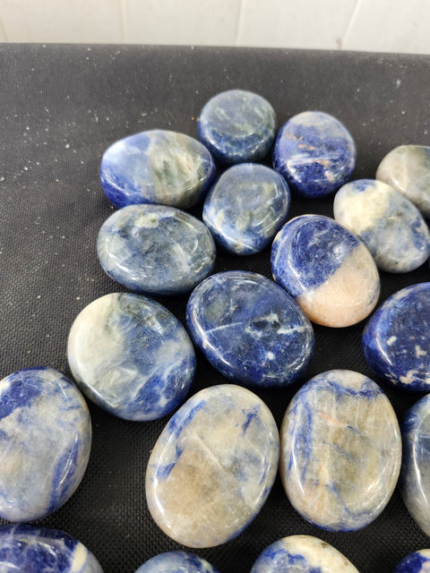 1.5 ounce, 1.75 inch sodalite palm stone uv reactive