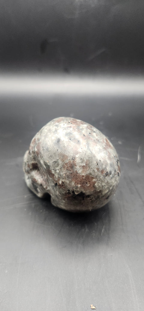 Mini flame stone skull. 5 ounces, 2.5 inches