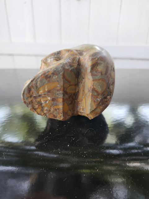Fruit jasper skull, 1.3 pounds, 3.75 inches long, 3 inches tall, 2.5 inches wide