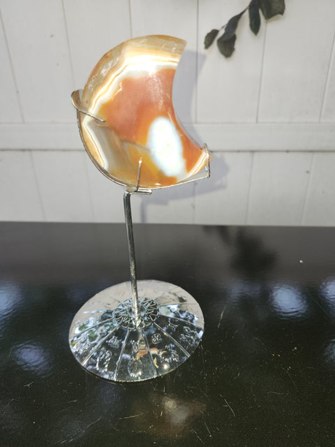 5.4 ounce carnelian moon with zodiac stand
