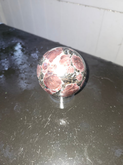 1.5 pound, 69.6mm, 2.74 inch Astrophyllite garnet fireworks sphere