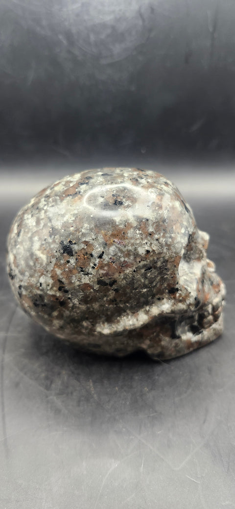 Flame stone " yooperlite" skull! 3 inches tall, 3 long, 14.7 ounces