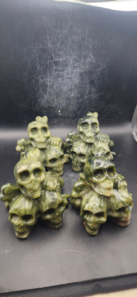 Nephrite jade skull and crossbones 12.5 ounces, 3.3" long