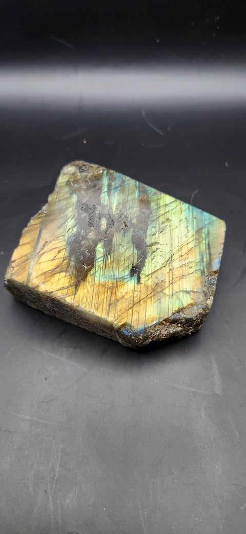 One side polished labradorite freeform. 9.3 ounces, 2.9 by 2.7 inches