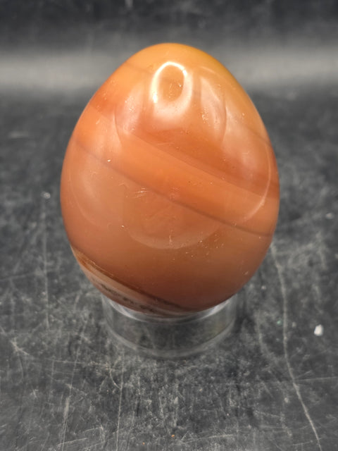 Carnelian agate egg! 6 ounces, 2.3 inches tall, 1.8 inches wide