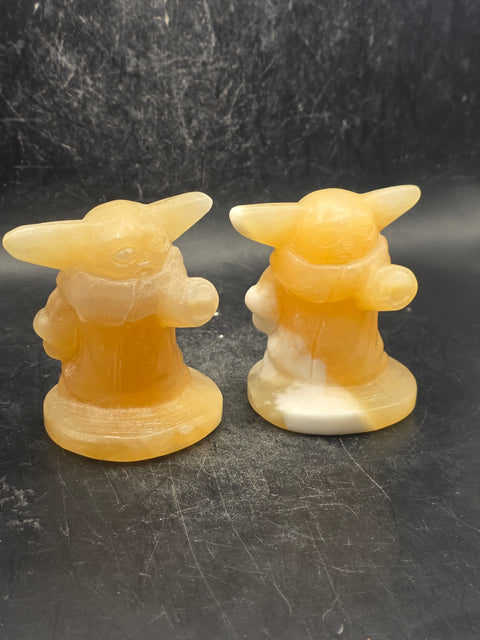 Orange calcite yoda! 4.4 ounces, 2.4 inches tall