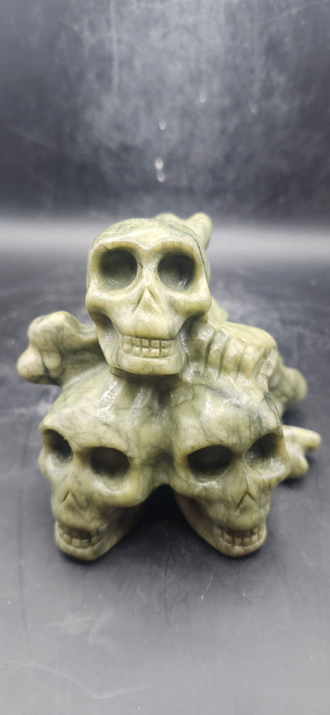 Nephrite jade skull and crossbones 12.5 ounces, 3.3" long