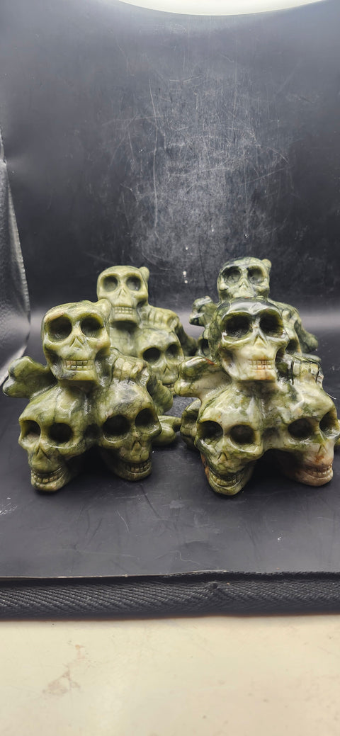 Nephrite jade skull and crossbones 12.5 ounces, 3.3" long