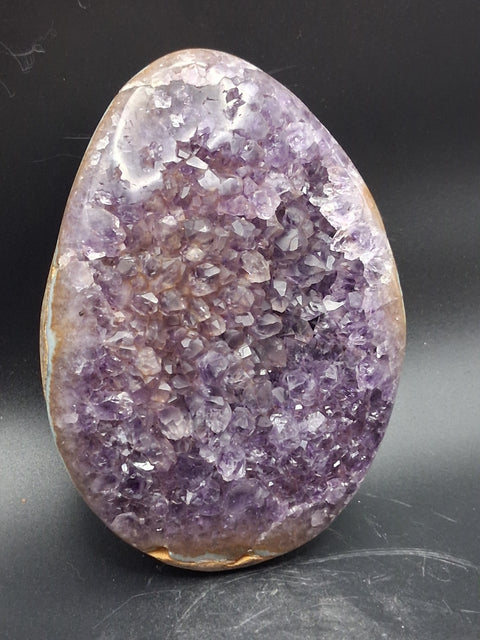 Super seven amethyst egg! 1.13 pounds, 4.8 inches by 3.5"