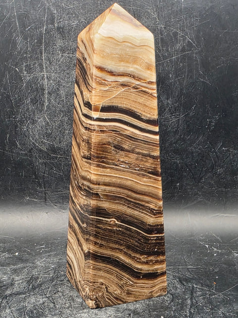 Chocolate calcite tower! 15 ounces, 5.5 inches tall, 1.6" wide