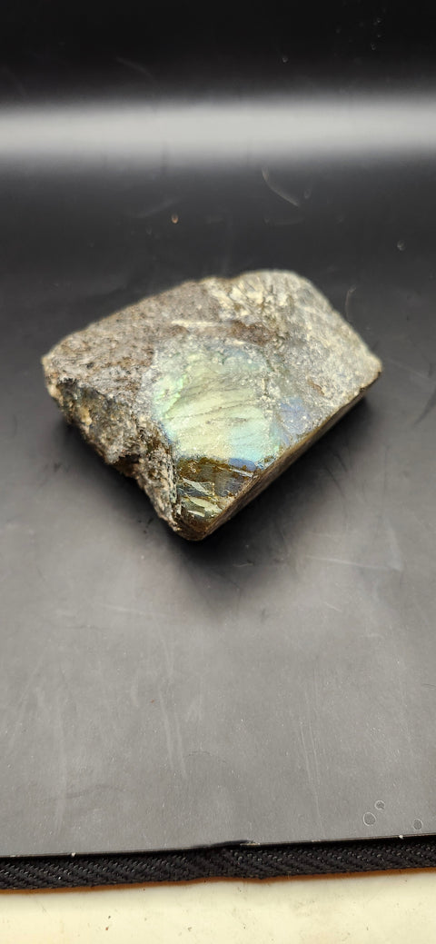 One side polished labradorite freeform. 9.3 ounces, 2.9 by 2.7 inches