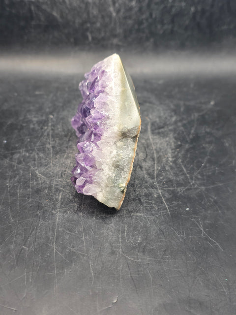 Amethyst polished top point! 6 ounces, 2.3 inches tall, 3.3" wide