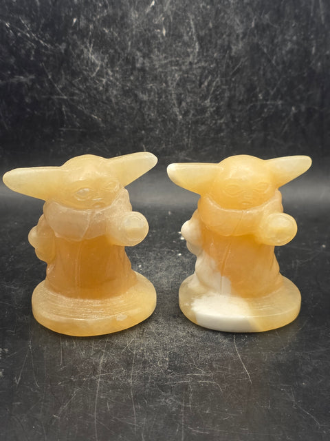 Orange calcite yoda! 4.4 ounces, 2.4 inches tall