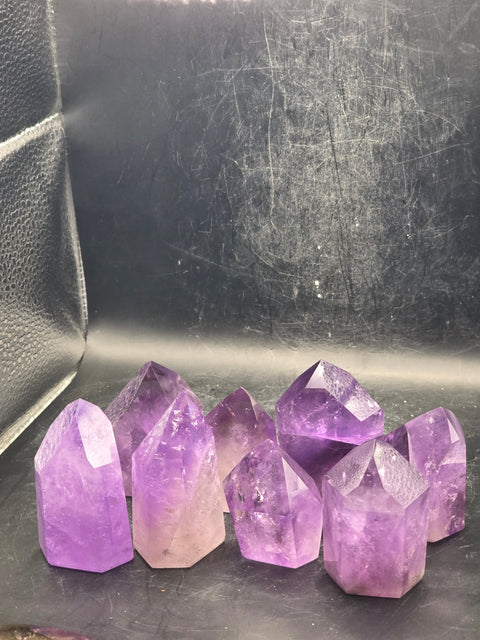 Grade AA amethyst polished point! 2 to 3 ounces!!!