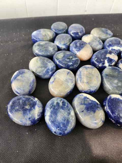 1.5 ounce, 1.75 inch sodalite palm stone uv reactive