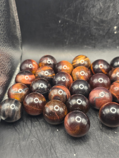 Mini 22mm, .8 inch red tiger eye sphere!