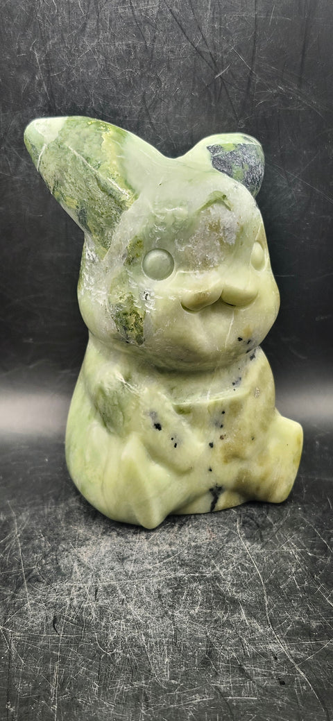 Serpentine Pikachu! 1.6 pounds, 4.5 inches tall, 2.7 inches wide