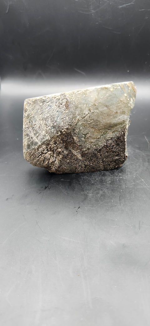 One side polished labradorite freeform. 9.3 ounces, 2.9 by 2.7 inches