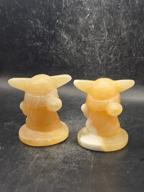 Orange calcite yoda! 4.4 ounces, 2.4 inches tall