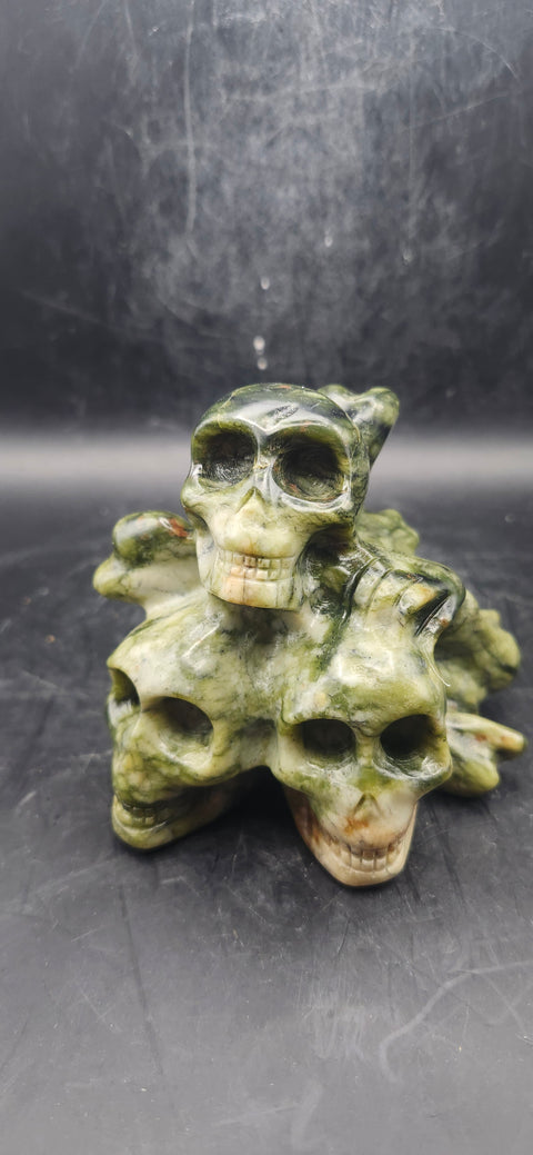 Nephrite jade skull and crossbones 12.5 ounces, 3.3" long
