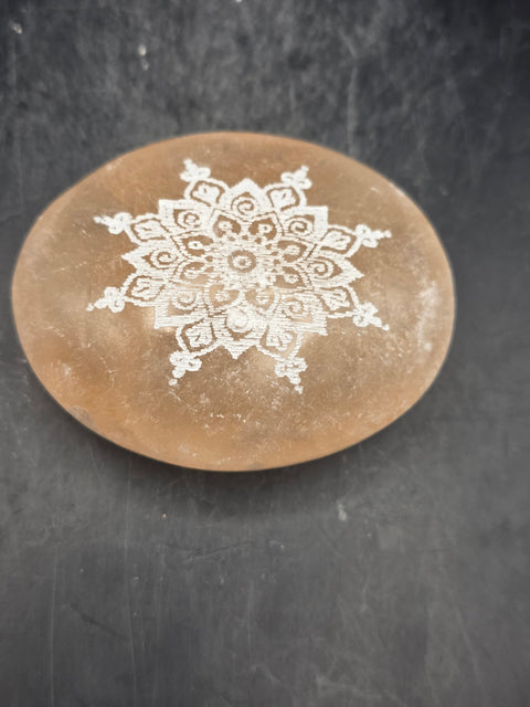 Peach selenite mandala etched palm stone! 2.5 inches wide