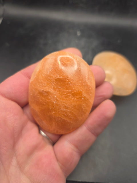 Peach selenite palm stone! 2.4 inches wide!