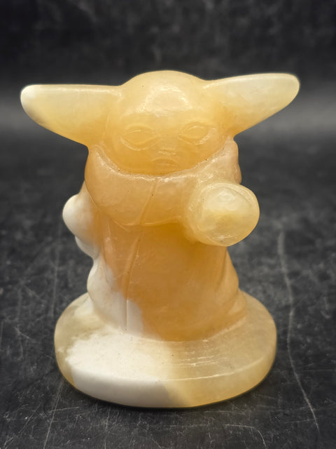 Orange calcite yoda! 4.4 ounces, 2.4 inches tall