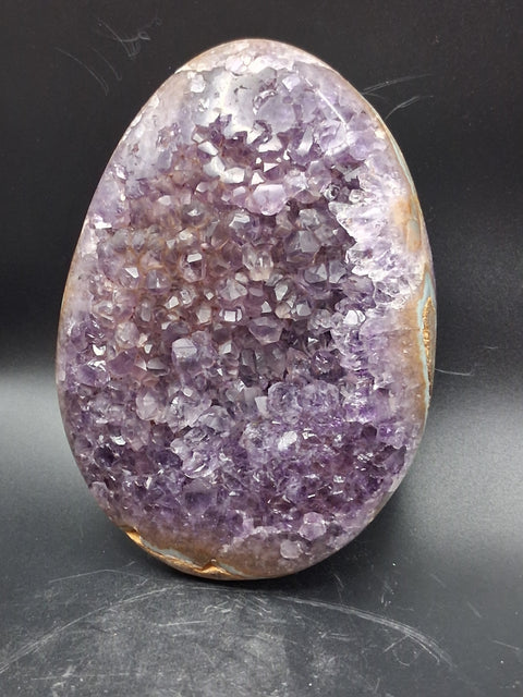 Super seven amethyst egg! 1.13 pounds, 4.8 inches by 3.5"