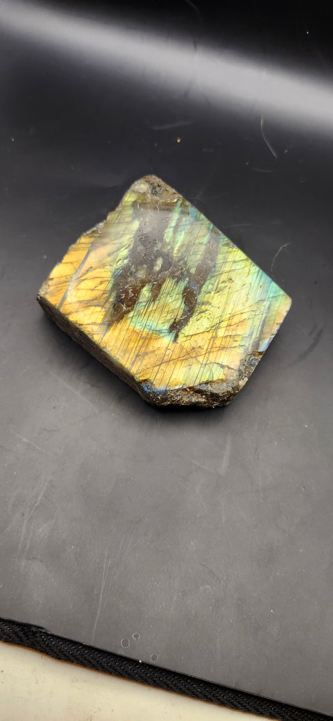 One side polished labradorite freeform. 9.3 ounces, 2.9 by 2.7 inches