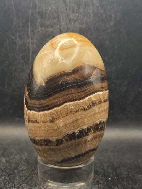 Chocolate calcite lingam! 1.6 pounds, 4.2 inches tall, 2.5" wide!