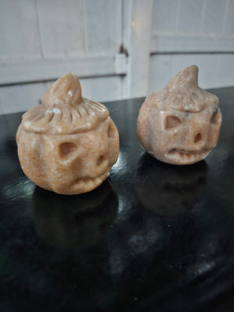 Orange calcite pumpkin. 9 ounces, 3 inches tall