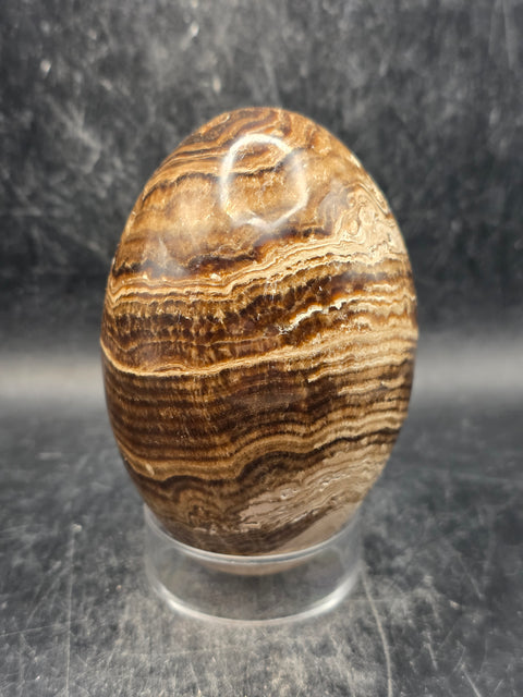 Chocolate calcite lingam! 15.6 ounces, 3.5 inches tall, 2.3" wide