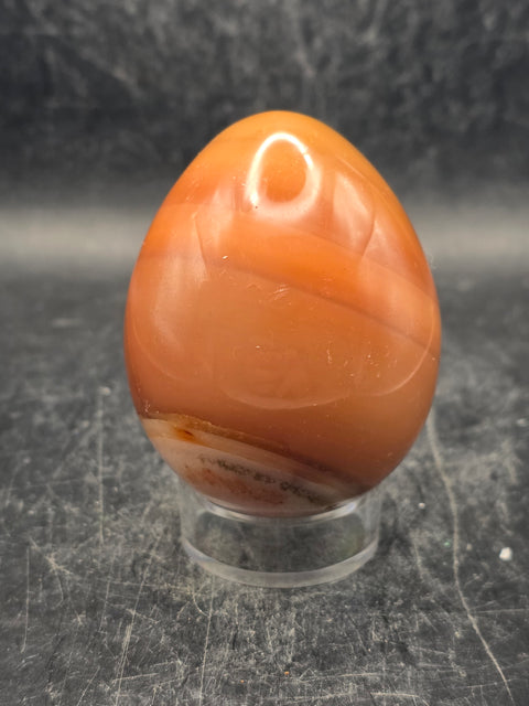 Carnelian agate egg! 6 ounces, 2.3 inches tall, 1.8 inches wide