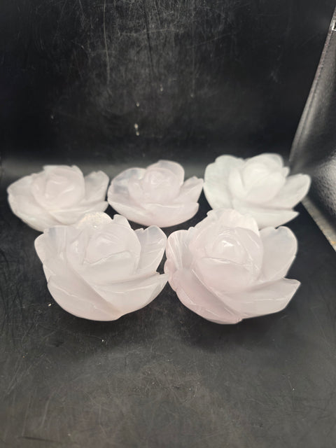 Mangano calcite flower carving! Uv reactive! 5.4 ounces, 2.6 inches