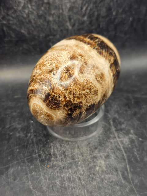 Chocolate calcite lingam! 11.8 ounces, 3.3 inches tall, 2" wide