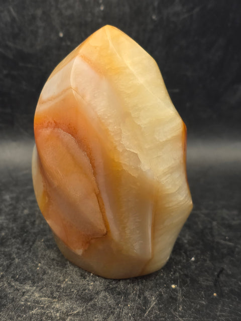 Carnelian agate flame tower! 12 ounces, 3.3 inches tall, 2.2" wide!
