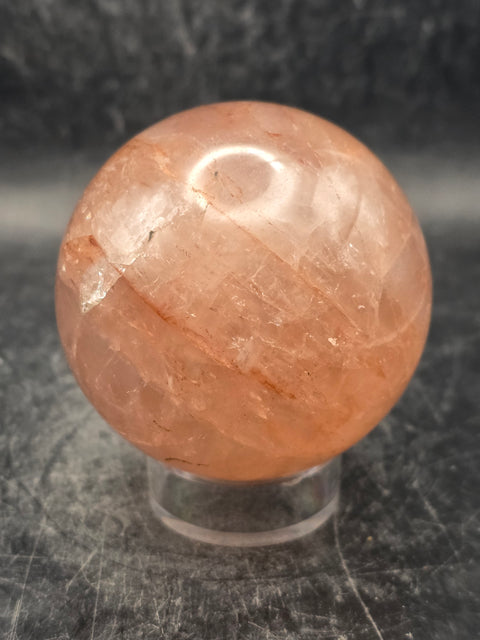 Red hematoid fire quartz sphere! 9.2 ounces, 57mm, 2.2 inches