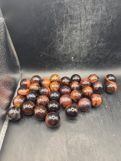 Mini 22mm, .8 inch red tiger eye sphere!